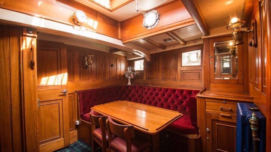 Evening Champagne Cruise on Historic 1935 Motor Yacht. - The anchored cove pause: where the noise disappears