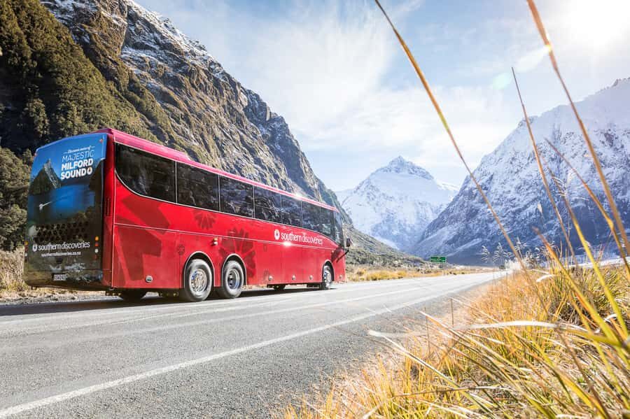 From Queenstown: Milford Sound Day Trip on Premium Coach - The Milford Road day flow: Te Anau reset and timed photo stops