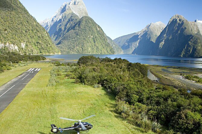 Milford and Fiordland Highlights Tour by Helicopter from Queenstown - Milford Sound from the air: waterfalls, rainforest, and the Tasman Sea turn