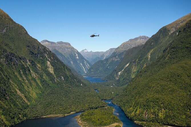 Milford Sound Earnslaw Burn Helicopter Tour from Queenstown - Stop 1: Fiordland National Park landing for snow-or-rock photos