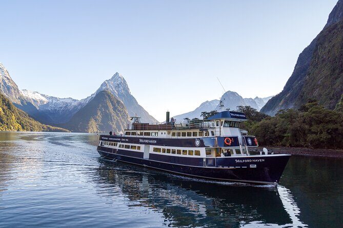 Milford Sound Full Day Tour from Te Anau with Cruise - Mirror Lakes boardwalk: a tiny walk with big photogenic payoff