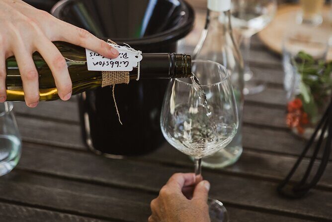 Queenstown: Afternoon Wine & Beer Tour with Platters - Stop 2 at Kinross Cellar Door and Cottages: Hosted Tastings Across Five Producers