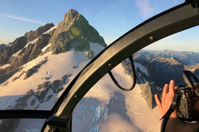 Queenstown Helicopter Tour: Glacier Landing and Scenic Views - Tyndall Glacier Pass: Blue Ice, Seracs, and Crevasses