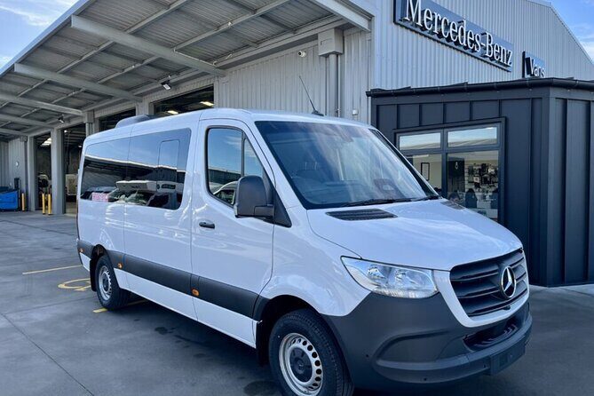 Queenstown International Airport To and From City Center Transfer - Meeting your driver in the arrivals hall with a clear sign