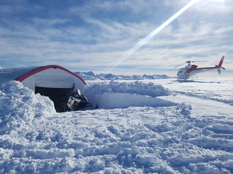 Queenstown: Snowmobiling Experience with Helicopter Flight - Coach transfer, gear-up, and how you stay warm for real