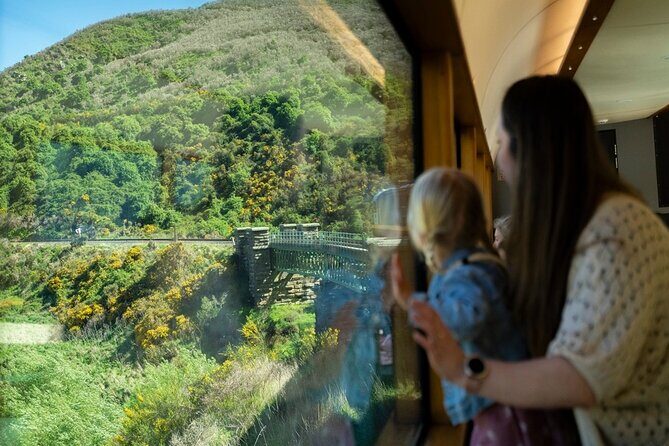 Queenstown to Dunedin with Taieri Gorge Train One-Way Tour - Road trip highlights: Gibbston, Kawarau Gorge, Lake Dunstan, and Cromwell