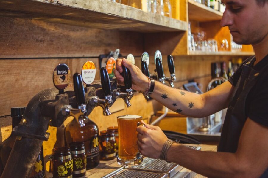 Queenstown: Twilight Wine and Craft Beer Tour - Three tastings: how the flow works from first stop to last